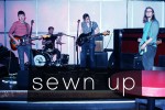 SEWN UP